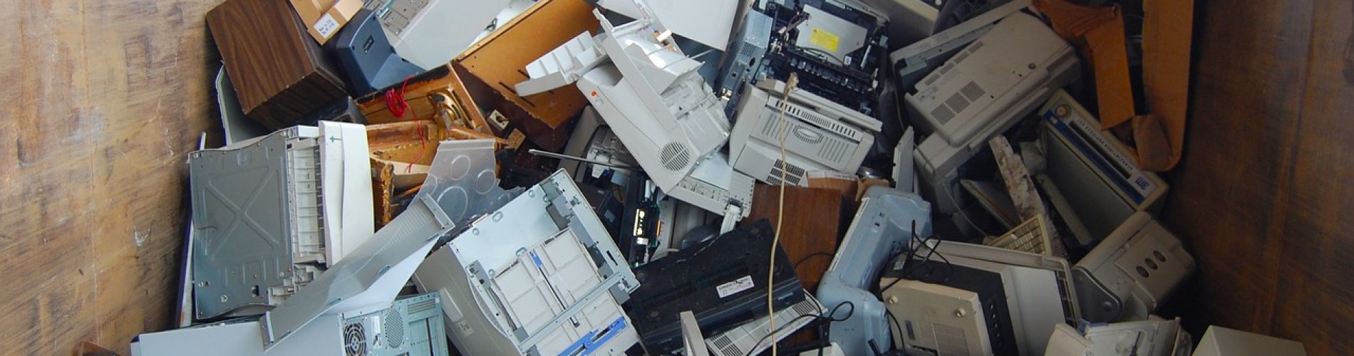 several electronics equipment on recycling site
